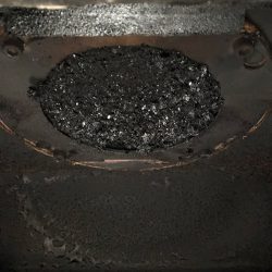 flue blocked with tar