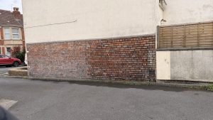 Hacking out old mortar